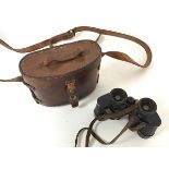 A pair of Ross of London, Mill Hill, 1918, no.5179 binoculars and an earlier, case no.3 for