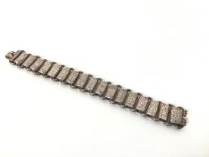 A late 19thc white metal rectangular engraved panel link bracelet with a snap fastening (l.18cm) (