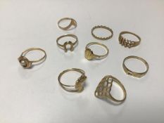 A collection of nine various 9ct and yellow metal dress rings (9.4g)