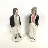 A pair of 19th century Staffordshire figures, Robert Burns and Highland Mary, each in polychrome