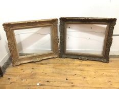 Two similar carved gilt frames with foliate decoration (some losses) (68cm x 80cm x 8cm)