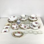 A mixed lot comprising a part tea service by Crown including three teacups, nine saucers, eight side