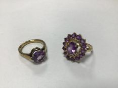 A yellow metal dress ring mounted circular amethyst in claw setting (N/M), and a 9ct gold amethyst