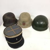 A 1942 Failsworth Hats Ltd., pith helmet, size 6 1/8 (h.16cm), a 1940s helmet inscribed Sergeant