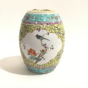 A Chinese Republic famille jaune barrel style ginger jar with bird on prunus branch enclosed