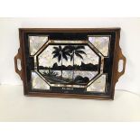 An inlaid drinks tray decorated with a scene of Rio de Janeiro with a teak frame bearing stamp