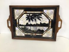 An inlaid drinks tray decorated with a scene of Rio de Janeiro with a teak frame bearing stamp