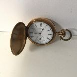 A Waltham gentleman's gold plated pocket watch with enamel dial and roman numerals, bears cypher