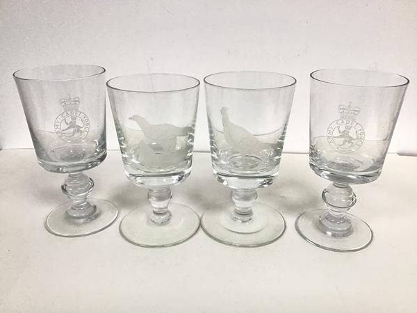 A pair of goblets, one etched with a Cock Pheasant, the other with a Bird of Prey, also a pair of