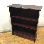 A Stag open bookshelf, the rectangular top with moulded edge and rounded front corners above two