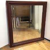 A wall mirror with bevelled glass plate and moulded frame (68cm x 63cm)