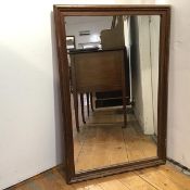 A wall mirror in moulded wooden frame (90cm x 60cm)