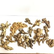 A collection of seventeen various winged cherub musician figure groups (a lot) (largest: h.24cm x
