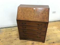 A George II style walnut fall front bureau, c.mid 20thc., the rectangular crossbanded top