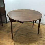 A George III mahogany and inlaid pembroke table, the oval top inlaid with a central paterae above