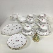 A Shelley teaset in Charm pattern, including six cups and saucers, sugar bowl and cream, six tea