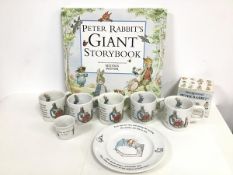 Beatrix Potter interest: a set of five similar Wedgwood Peter Rabbit teacups, one complete with