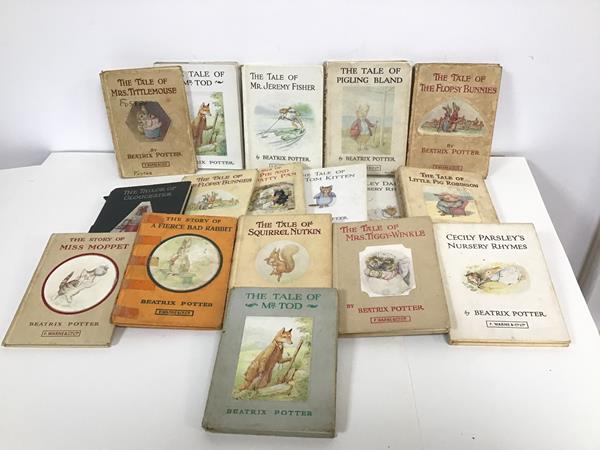 A collection of Beatrix Potter children's books including Tom Kitten, Mr Jeremy Fisher, Flopsy
