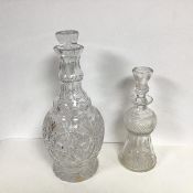 A large cut crystal decanter with thumb cut decoration to neck and a sunburst design to body (h.