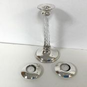 A pair of Mappin & Webb Birmingham silver tea light holders, both marked 925 (d.8cm) (90.28g) and an