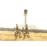 A pair of cast brass Adam style urn finial firedogs on pad feet (25cm x 12cm) and brass toasting