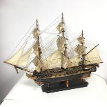 A model of a square rigged ship, with plaque HMS Surprise, 1794, hand crafted by Admiralty Ship