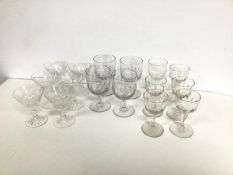 A set of six thumb cut port glasses, one slightly larger, four thumb cut sherry glasses, six crystal