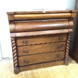 A mid 19thc Scottish mahogany ogee chest, the rectangular breakfront top with cushion frieze