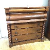 A mid 19thc Scottish mahogany ogee chest, the rectangular breakfront top with cushion frieze