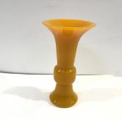 A Peking glass Gu-form vase, in yellow, with engraved seal mark to base. 24cm