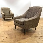 A pair of 1950's lounge chairs, each upholstered in oatmeal coloured tweed, raised on turned