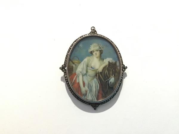 Continental School, 19th century, a portrait miniature of a girl with her horse en route to