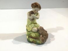 A Royal Worcester figure, "My Favourite", modelled by F. Doughty, no. 3014, puce printed marks (