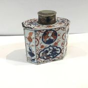 A Chinese Imari porcelain tea caddy, 18th century, of shaped octagonal form, with (later) white