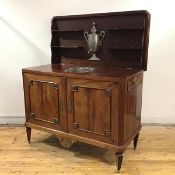 An 19th century French Transitional gilt-metal mounted mahogany combination commode and travelling