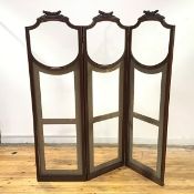 A part-glazed mahogany-framed three-fold dressing screen in the French taste, c. 1900, each leaf