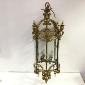 An imposing gilt-brass hall lantern in 19th century style, cylindrical, with four etched glass