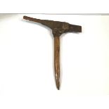 A Mount Hagen axe, Papua New Guinea, of characteristic form, with steel blade. 54cm by 50cm