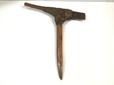 A Mount Hagen axe, Papua New Guinea, of characteristic form, with steel blade. 54cm by 50cm