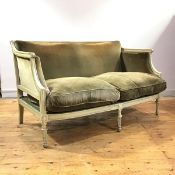 A French painted two seater canape sofa, c. 1900, with fluted roller top rail, downswept arms with