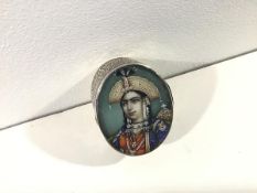 Indian School, a portrait miniature of a young princely figure, oval, watercolour on ivory, under