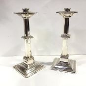 A pair of George VI silver ecclesiastical candlesticks, Tudor Art Metal & Plating Co. London 1938,