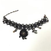 Erickson Beamon, a black and colourless crystal choker necklace, of festoon design. Length 29cm