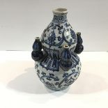 A Chinese blue and white porcelain tulip vase, of double gourd form, with four baluster-form