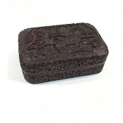 A Chinese cinnabar lacquer box, rectangular, the lift-off cover densely decorated with figures,