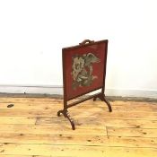 An early 20thc wooden framed firescreen, the rectangular beadwork banner with a depiction of an