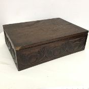 An early 20thc. bible box, the rectangular hinged top over a carved frieze to each side (12cm x 41cm