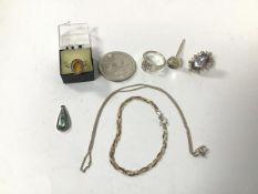 An interlaced S link bracelet marked 925, a chain link necklace marked 925, a silver teardrop