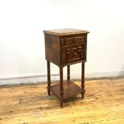 A French walnut bedside cabinet, mid 20thc., the square marble top above a fluted frieze drawer, and