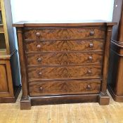 A large Scottish chest, mid 19thc., the inverted breakfront top above five long graduated drawers,